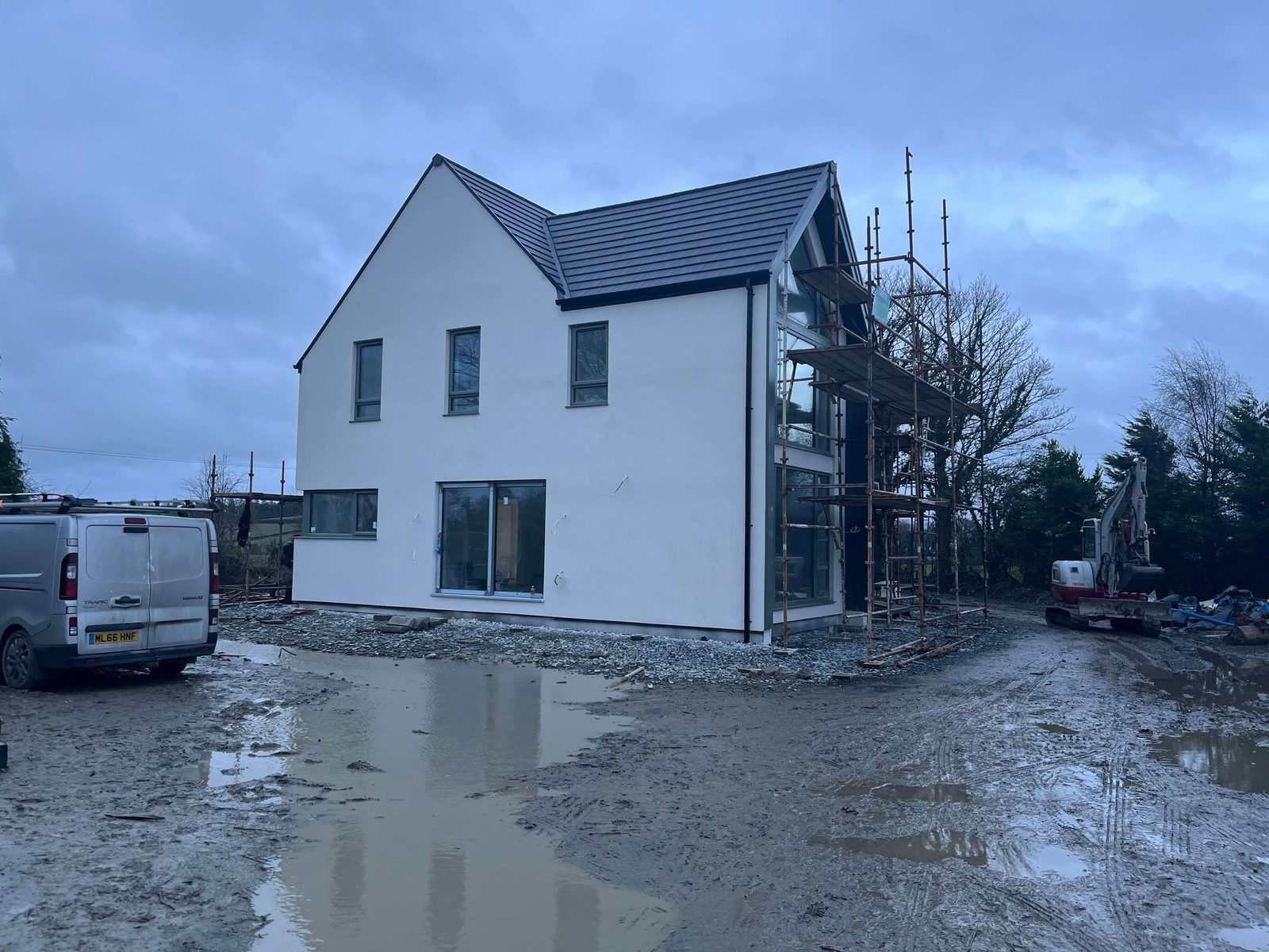HBC Timberframe — completed residential build, white rendered exterior